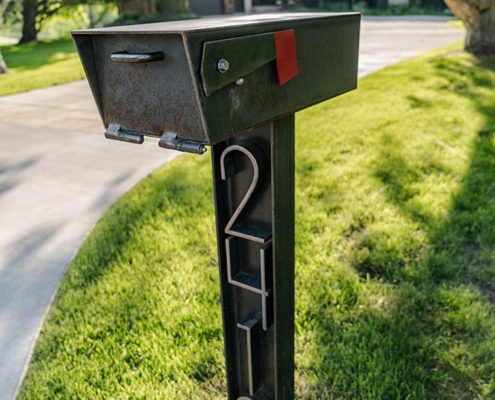 Steel mailbox and street numbers
